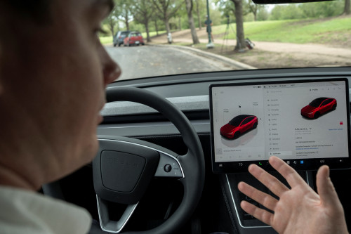 Tesla invites select few to Texas robotaxi trial with front seat safety monitors