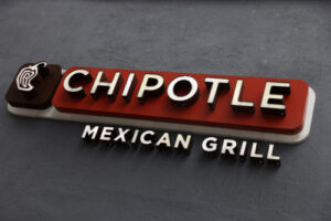 Chipotle cuts sales target as dining out slows; shares drop
