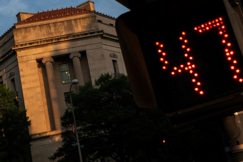 US Justice Department drops bid to block corporate travel company merger