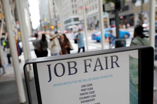 US jobless claims slide to cap a bumpy year for job market