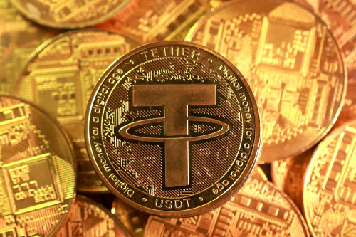 Tether says it bought 27 tons of gold in fourth quarter
