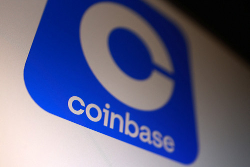 Coinbase posts surprise loss on crypto trading slowdown