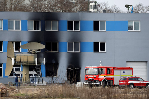US citizen among three held over arson attack on Czech arms producer, police say