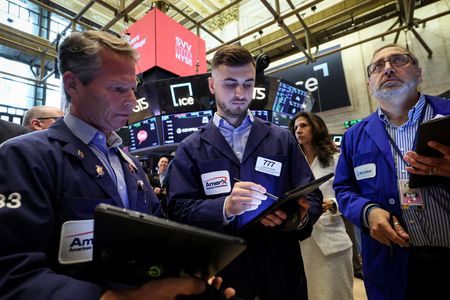 Wall St ends slightly higher in shortened session, Tesla jumps