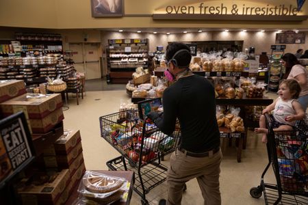 Instacart shares end up 12% on debut after initial pop