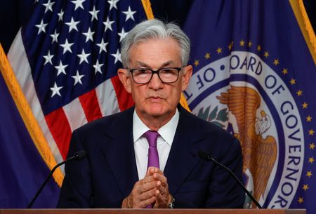 Fed keeps rates steady, toughens policy stance as ‘soft landing’ hopes grow