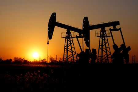 Oil prices settle near flat in choppy trade; Russia eases fuel export ban