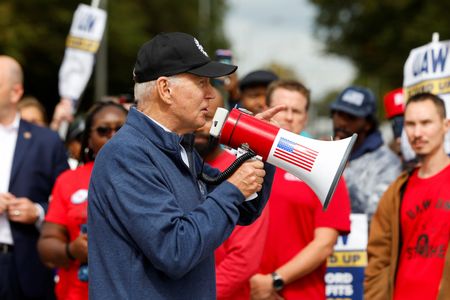 Biden says UAW should fight for 40% pay raise in Michigan strike visit