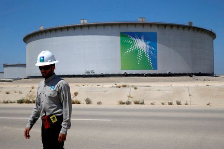 Oil settles lower but ends quarter up 28% on tight global supply