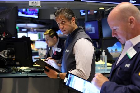 Wall Street ends sharply higher, dollar softens as data points to economic resilience