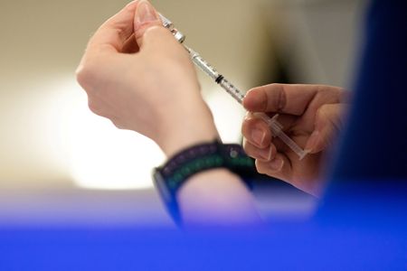 Explainer-Do I need to worry about COVID again?